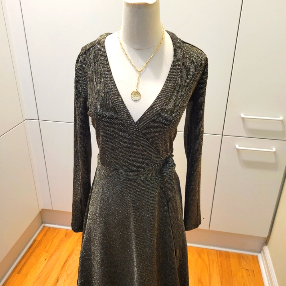 Never worn Black/gold wrap dress